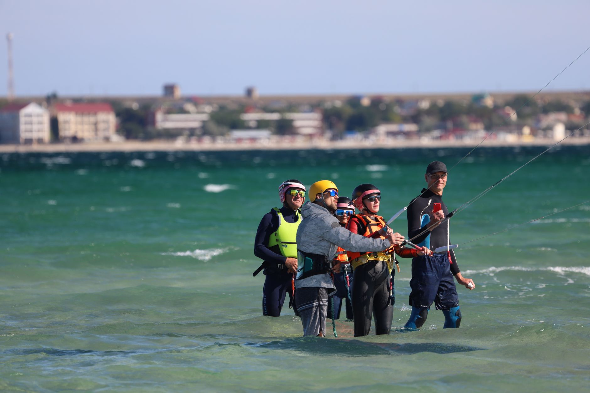 Watersports lover in standing-depth shallow water
