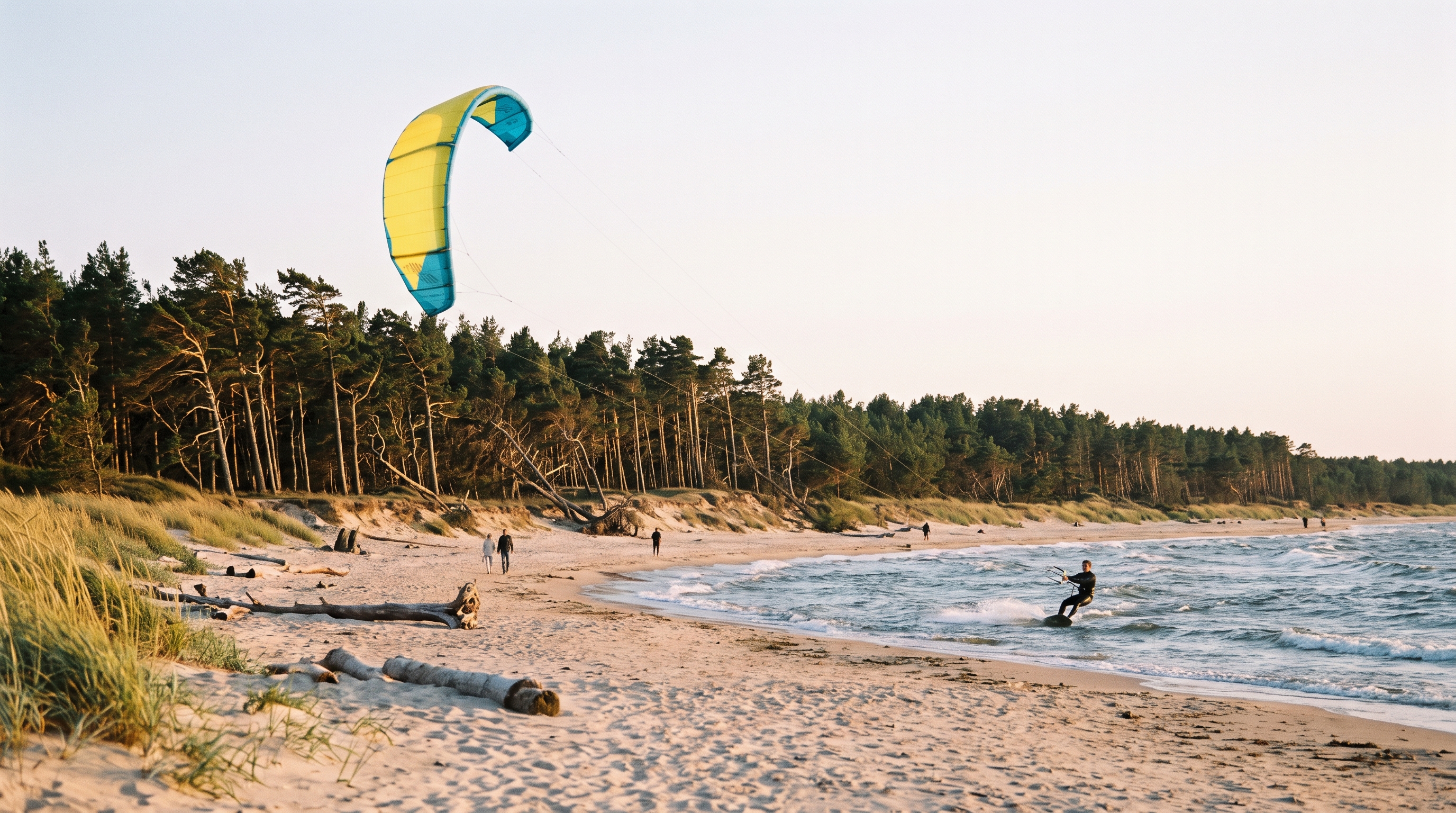 Kitesurfing on a wide sandy beach near Jurmala on the Latvian Baltic coast