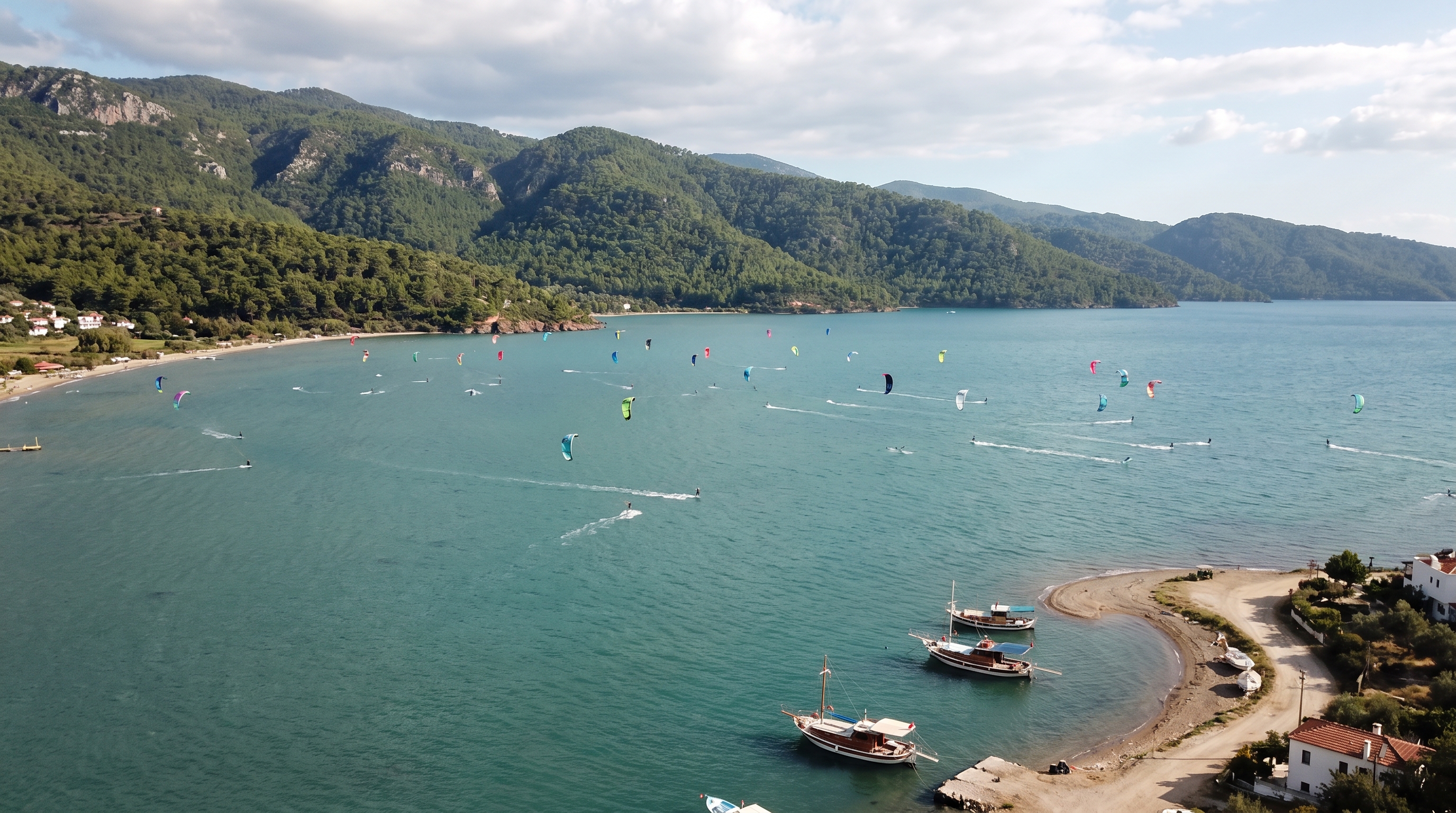 Kitesurfing in the turquoise shallow-water lagoon of Alaçatı on Turkey's Aegean coast